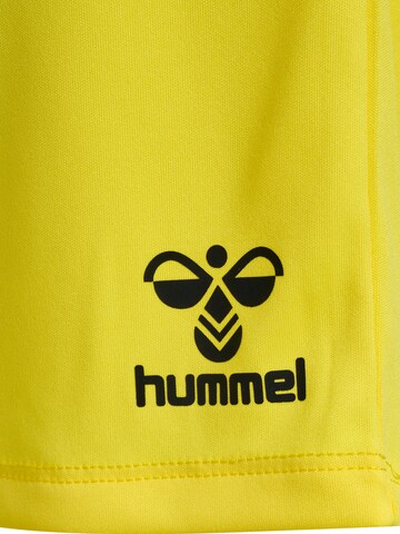 Hummel Regular Sports trousers 'Essential' in Yellow