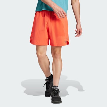ADIDAS PERFORMANCE Regular Workout Pants in Orange: front