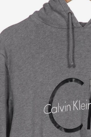 Calvin Klein Jeans Kapuzenpullover L in Grau