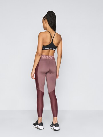NIKE - Skinny Calças de desporto em roxo