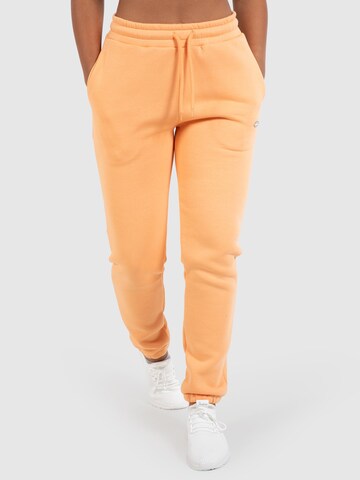 Smilodox Tapered Trousers ' Amaya ' in Orange: front
