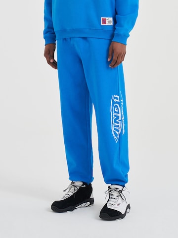 AND1 Tapered Nadrág - kék: elől