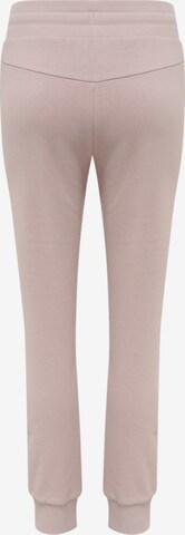 Effilé Pantalon de sport Hummel en rose