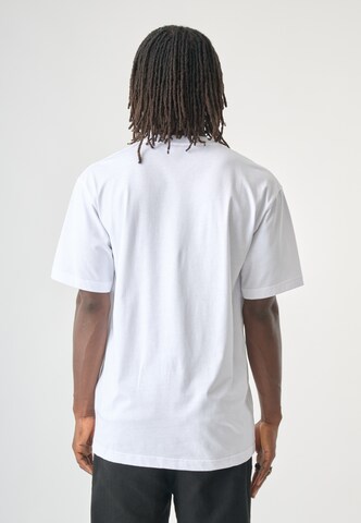 Cleptomanicx Shirt 'We run this' in White