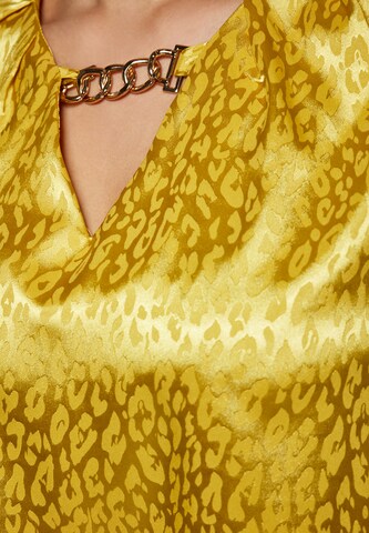 Camicia da donna di faina in giallo