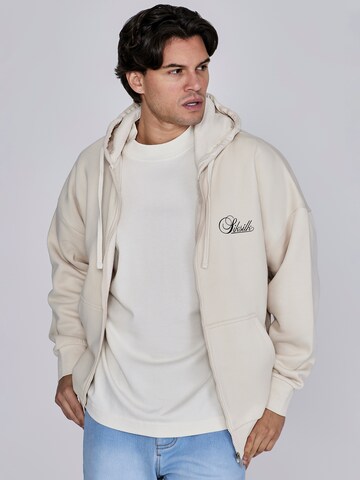 Veste de survêtement SikSilk en beige : devant