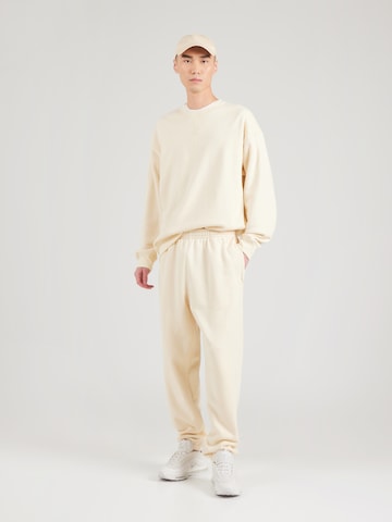 Regular Pantalon 'CLASSICS' Nike Sportswear en beige