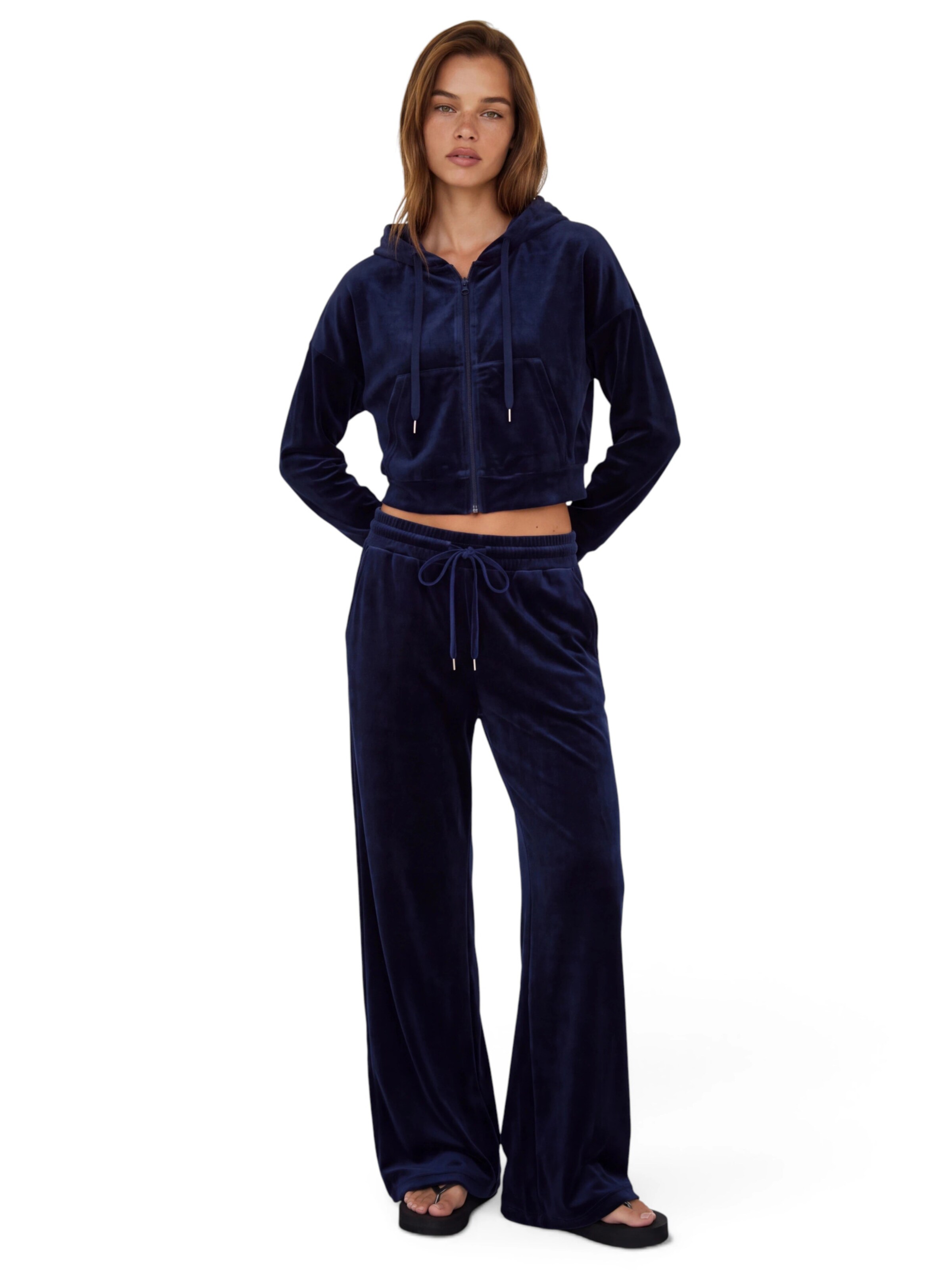 CHOLIDOU Flared Trousers in Blue: front