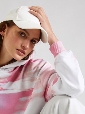 Calvin Klein Jeans Bluzka sportowa w kolorze biały