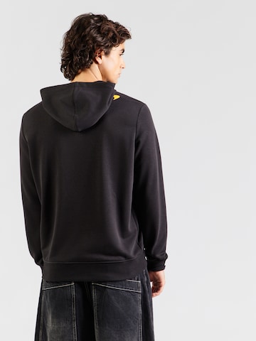 PUMASweater majica 'McLaren ESS' - crna boja