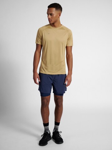 Newline Functioneel shirt 'Beat' in Bruin