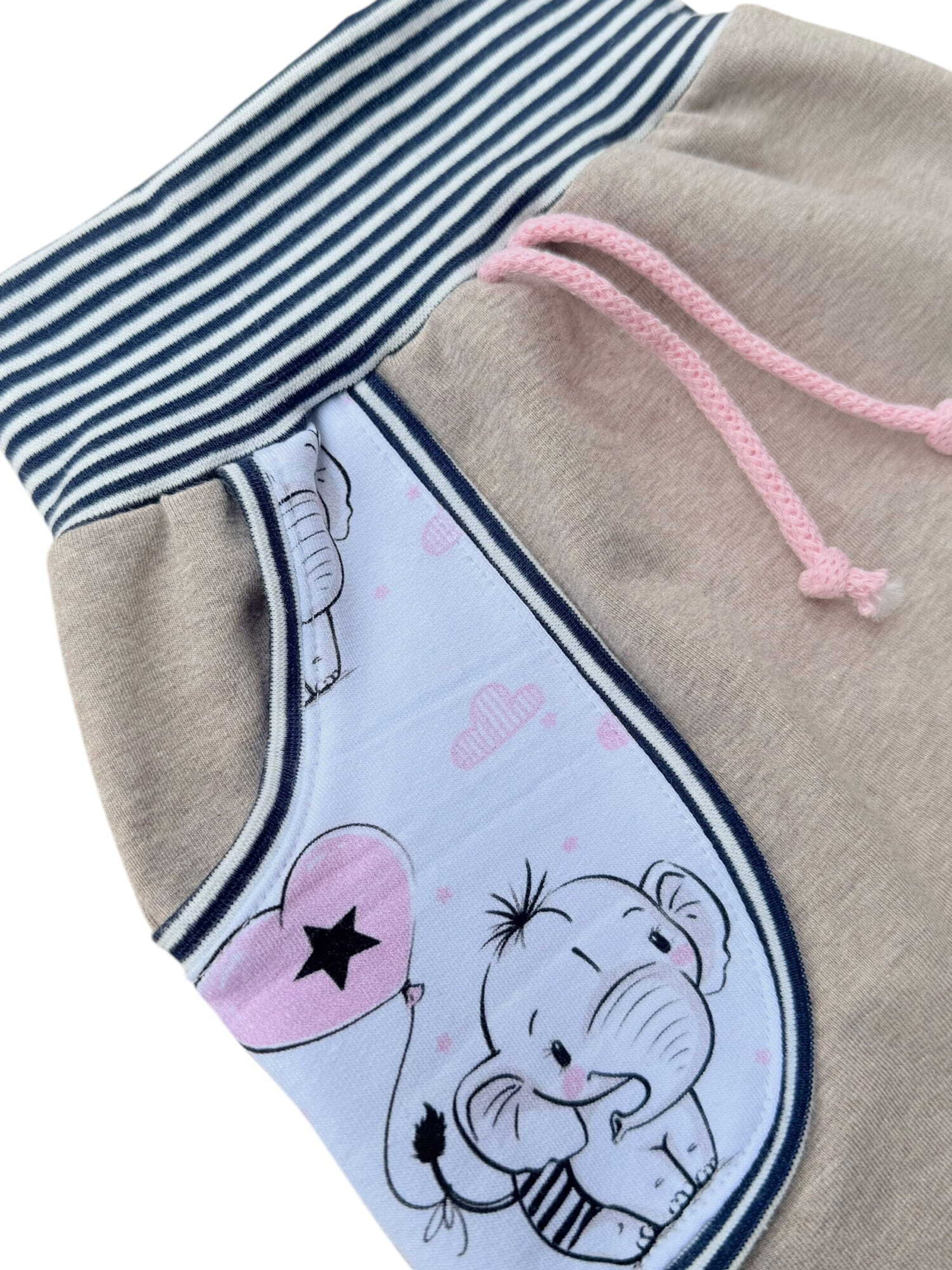 Land-Juwelen Tapered Trousers in Beige