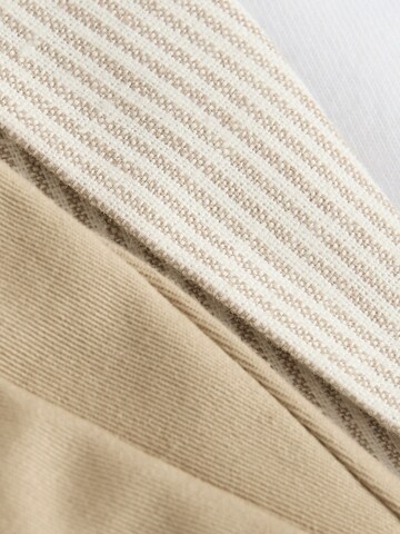 Set Next en beige