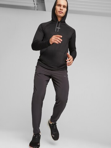 PUMA - Tapered Calças de desporto em preto