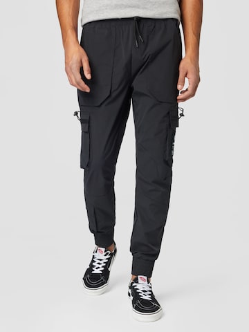 ALPHA INDUSTRIES Tapered Cargo Pants in Black: front