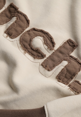 Sweat-shirt 'Bench X Superdry & Co' BENCH en marron