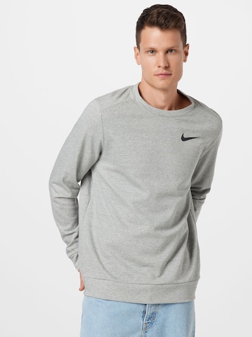 NIKESportska sweater majica - siva boja: prednji dio