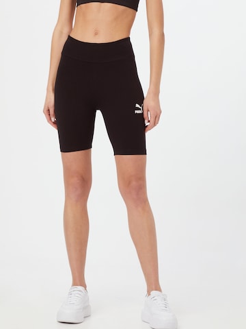 PUMA Skinny Leggings in Black: front