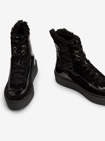 TOMMY HILFIGER Boots in Black