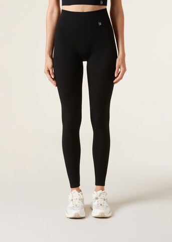 CALZEDONIA Skinny Athletic Pants in Black: front