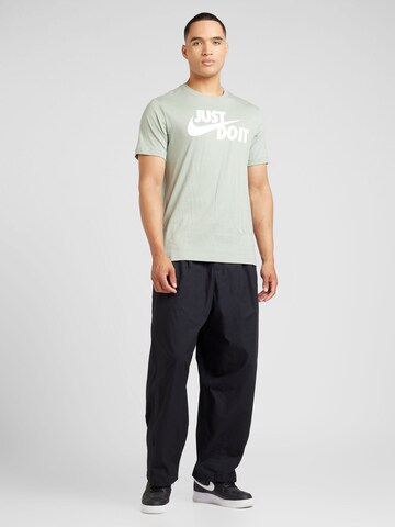 Nike Sportswear - Loosefit Pantalón 'CLUB' en negro