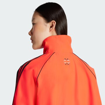 ADIDAS ORIGINALS - Casaco meia-estação 'Teamgeist Adicolor' em vermelho