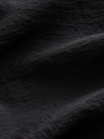 Combinaison Next en noir