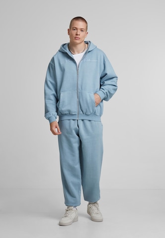 Veste de survêtement Karl Kani en bleu