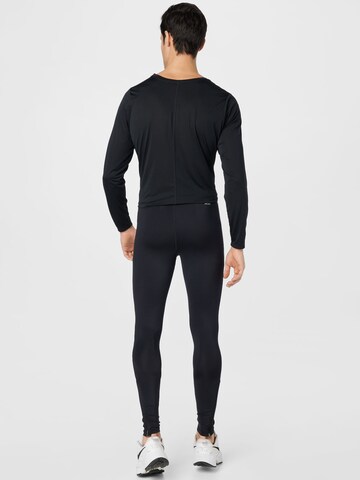 new balance Skinny Spodnie sportowe w kolorze czarny