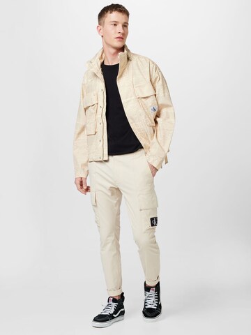 Skinny Pantaloni cargo di Calvin Klein Jeans in beige