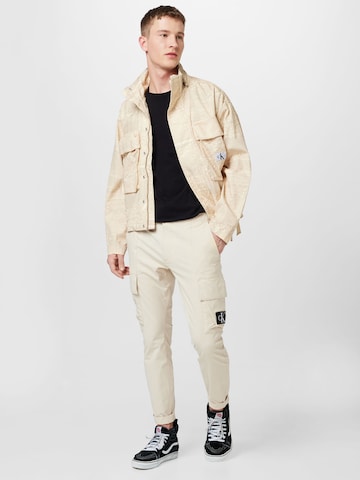 Skinny Pantalon cargo Calvin Klein Jeans en beige