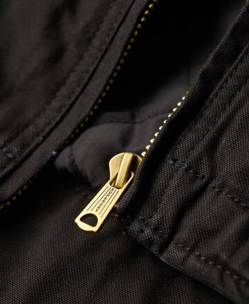 Superdry Between-season jacket 'Surplus Ranch' in Brown