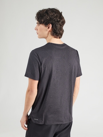 Tricou funcțional 'MOVE CLOUDSPUN' de la PUMA pe negru: spate