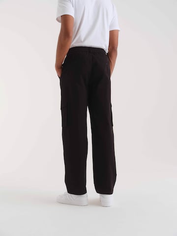 Loosefit Pantalon cargo 'Jaron' ABOUT YOU x Kevin Trapp en noir