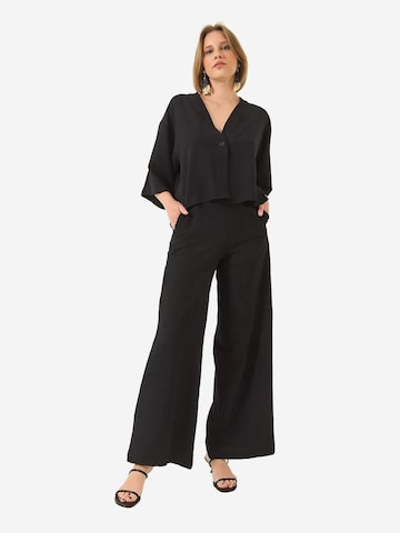 Completo pantalone di Bianco Lucci in nero: frontale