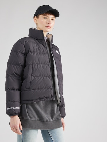 HELLY HANSEN Overgangsjakke i sort: forside