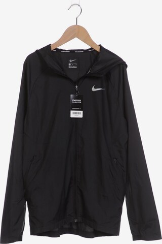 NIKE Jacket & Coat in S in Black: front