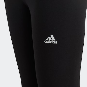ADIDAS SPORTSWEAR Tapered Workout Pants 'Essentials Linear Logo ' in Black