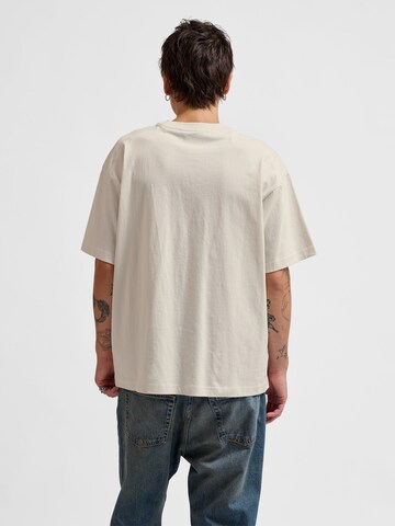 T-Shirt 'Headball' Hummel en blanc