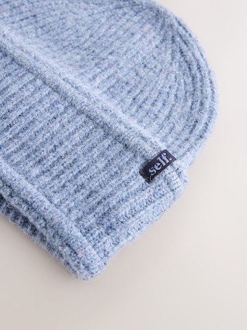 Bonnet self. en bleu