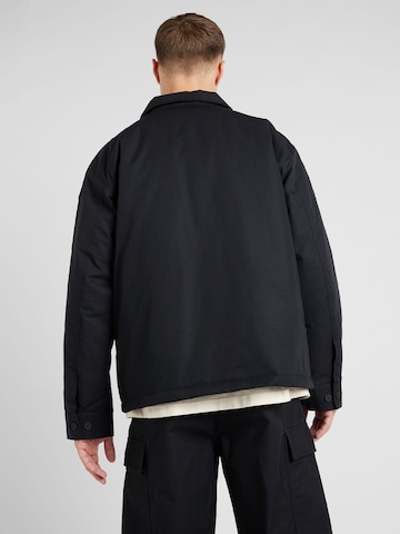 ADIDAS ORIGINALS Between-Season Jacket 'ESS+' in Black