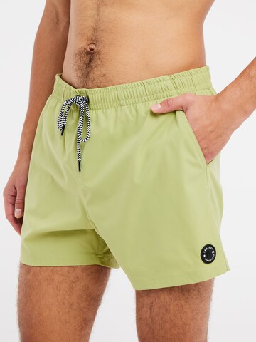 PROTEST Badeshorts 'PRTYESSINE' in Grün