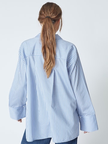 Chemisier 'Fina' co'couture en bleu