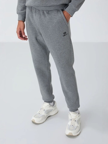 Tommy Life Joggingpak 'Aktive Sets' in Grijs