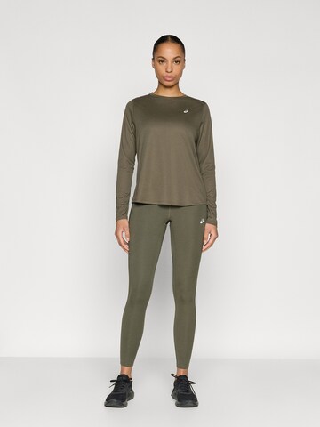 ASICS Skinny Sportovní kalhoty – zelená