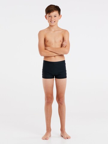 PROTEST Swimming shorts 'CARST JR' in Black: front