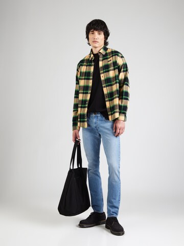 Coupe slim Jean 'Luke' Lee en bleu