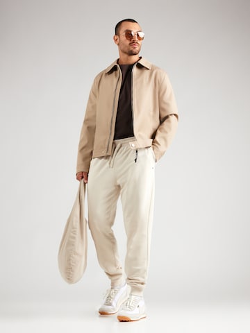 TOMMY HILFIGER Tapered Παντελόνι 'ESSENTIAL' σε μπεζ