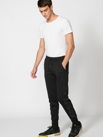 KOROSHI Regular Trousers in Black