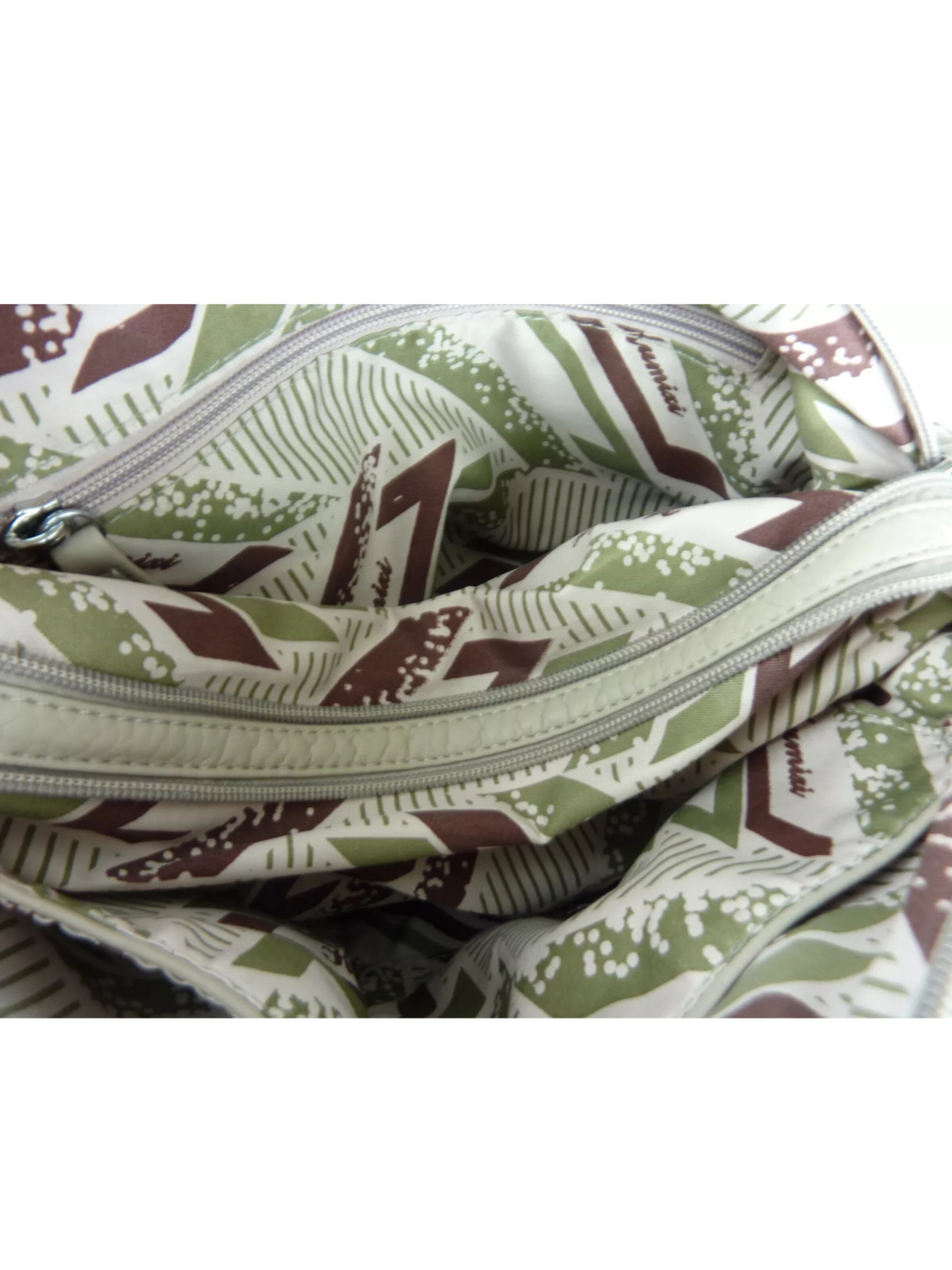 Kumixi Handtasche‌‌‌‌‌‌‌ in Beige